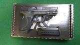 SMITH & WESSON M&P9 M2.0 Compact W/ Crimson Trace Green Laser-12414 - 1 of 3