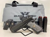 WILSON COMBAT EXPERIOR BLACK EDITION WITH TRIJICON SRO - 1 of 7