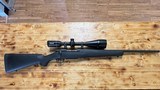 MOSSBERG PATRIOT W/ SCOPE - 1 of 4