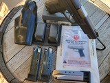 STURM, RUGER & CO., INC. Ruger P89 SA/DA 9mm Pistol, Model 03042, Extra Mags, Law Enforcement Duty Holster and Mag Pouch - 1 of 7