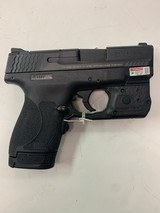 SMITH & WESSON 9mm M&P9 SHIELD M2.0 thumb safety with crimson trace laser - 1 of 4