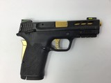SMITH & WESSON PERFORMANCE CENTER® M&P®380 SHIELD™ EZ® M2.0™ GOLD PORTED BARREL - 1 of 3