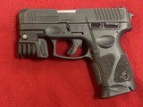 TAURUS g2c compact with laser and pocket clip - 1 of 7