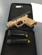 TAURUS INTERNATIONAL MFG., INC. Taurus PT-111 Millenium 9mm Two-Tone - 2 of 2