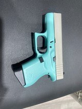 GLOCK 43 - Robin‚‚s Egg Blue / Shimmering Aluminum Cerakot - 1 of 4