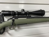 RUGER AMERICAN PREDATOR WITH VORTEX CROSSFIRE II RIFLESCOPE - 1 of 3