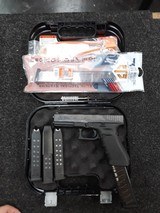 GLOCK 22 GEN 4 W/ EXTENDED MAGAZINE .40 S&W - 1 of 4