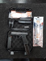 GLOCK 23 GEN 5 W/ EXTENDED MAGAZINE - 1 of 5