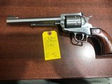 RUGER NEW MODEL SUPER BLACKHAWK STAINLESS - 1 of 3