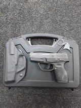 TAURUS 709 SLIM 9MM LUGER (9X19 PARA) - 1 of 4
