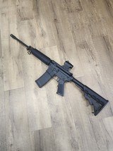 BUSHMASTER XM15-E2S w/ red dot 5.56X45MM NATO - 1 of 7