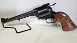 RUGER "NEW MODEL" SUPER BLACKHAWK STAINLESS .44 MAGNUM - 1 of 3