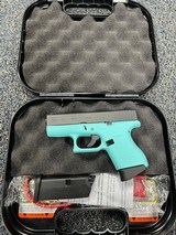 GLOCK 43 - Robin‚‚s Egg Blue / Shimmering Aluminum Cerakote 9MM LUGER (9X19 PARA - 2 of 3