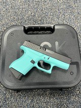 GLOCK 43 - Robin‚‚s Egg Blue / Shimmering Aluminum Cerakote 9MM LUGER (9X19 PARA - 1 of 3