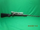 REMINGTON MODEL 700 .338 RUM - 2 of 3