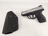 TAURUS PT 709 Slim 9MM LUGER (9X19 PARA) - 1 of 3