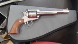 RUGER "NEW MODEL" SUPER BLACKHAWK STAINLESS .44 MAGNUM - 1 of 3