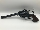 RUGER NEW MODEL SUPER BLACK HAWK .44 MAGNUM - 1 of 3