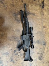 BUSHMASTER carbon 15 5.56X45MM NATO - 1 of 2