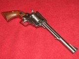 RUGER "NEW MODEL" SUPER BLACKHAWK STAINLESS .44 MAGNUM - 1 of 3