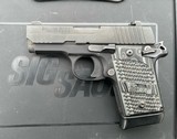 SIG SAUER P938 9MM LUGER (9X19 PARA) - 1 of 2