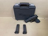 SIG SAUER SP2022 9MM LUGER (9X19 PARA) - 1 of 3