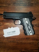 DAN WESSON FIREARMS ECO 9MM LUGER (9X19 PARA) - 1 of 2