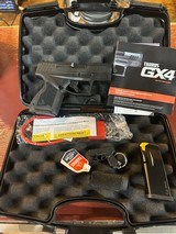 Taurus GX4 9MM LUGER (9X19 PARA) - 1 of 3