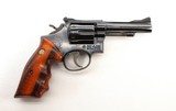 SMITH & WESSON 15-3 COMBAT MASTERPIECE .38 SPL - 1 of 3