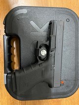 GLOCK 23c .40 S&W - 1 of 3