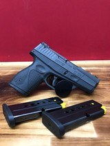 TAURUS PT709 SLIM W/ 3 MAGS 9MM LUGER (9X19 PARA) - 1 of 3