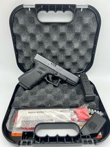 GLOCK 23 .40 CALIBER - 1 of 3