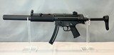 HECKLER & KOCH MP5 with Faux Suppressor .22 LR - 1 of 3