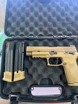 SIG SAUER M17 9MM LUGER (9X19 PARA) - 1 of 3