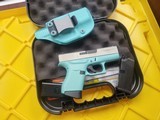 GLOCK 43 - Robin‚‚s Egg Blue / Shimmering Aluminum Cerakote 9MM LUGER (9X19 PARA - 2 of 3