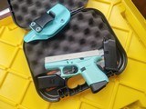 GLOCK 43 - Robin‚‚s Egg Blue / Shimmering Aluminum Cerakote 9MM LUGER (9X19 PARA - 1 of 3