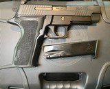 SIG SAUER P226 ELITE 9MM LUGER (9X19 PARA) - 1 of 2
