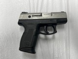 TAURUS MILLENIUM PT140 PRO .40 S&W - 1 of 3