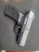 RUGER SR9/SR9C 9MM LUGER (9X19 PARA) - 1 of 3 RUGER SR9/SR9C 9MM LUGER (9X19 PARA) - 1 of 3