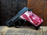 TAURUS PT-22 PINK PEARL GRIPS .22 LR - 1 of 3