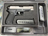 SIG SAUER P220 STAINLESS .45 ACP - 1 of 3