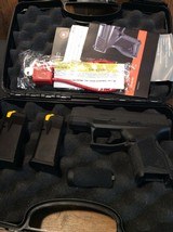 TAURUS GX4 CARRY 9MM LUGER (9X19 PARA) - 1 of 3