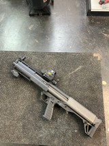 KELTEC KSG WITH GREEN/RED DOT, FLASHLIGHT AND GREEN LASER 12 GA - 1 of 3
