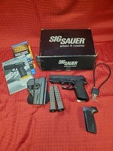 SIG SAUER SP2022 9MM LUGER (9X19 PARA) - 1 of 3