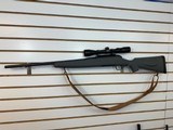 REMINGTON Model 710 w/Original Mag, Bushnell Scope .30-06 SPRG