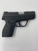 TAURUS PT-709 SLIM 9MM LUGER (9X19 PARA) - 1 of 3