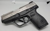 TAURUS PT740 SLIM .40 CALIBER - 1 of 3