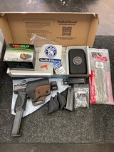 SMITH & WESSON m&p 9 metal carry comp true glo red dot 9MM LUGER (9X19 PARA) - 1 of 3