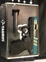 TAURUS TX22 COMPACT (BLUE FLAG VER.) .22 LR - 1 of 3