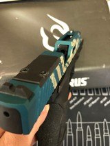 TAURUS TX22 COMPACT (BLUE FLAG VER.) .22 LR - 2 of 3